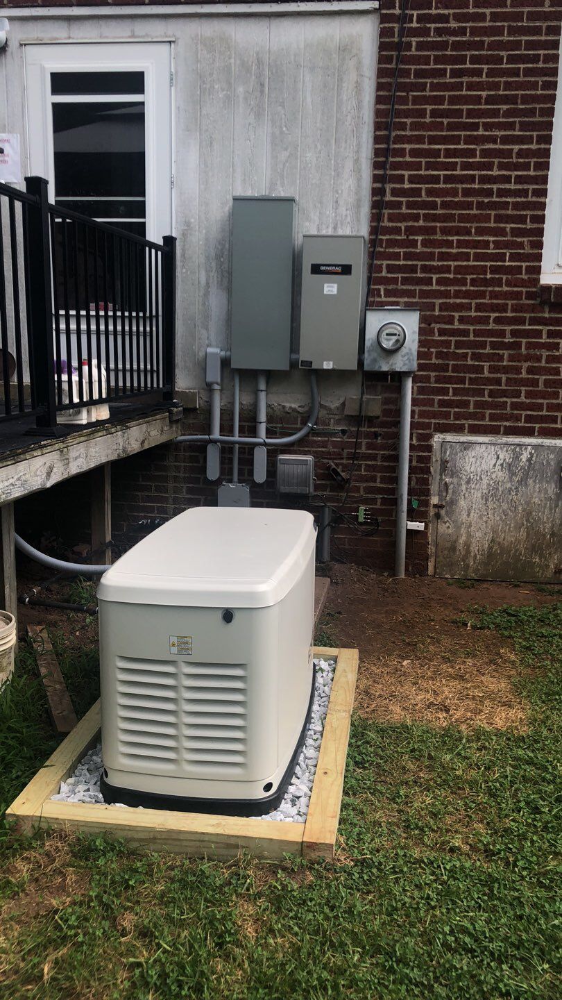 Technician performing generator maintenance