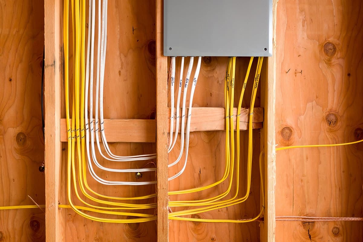 Electrician performing residential whole-home rewiring work